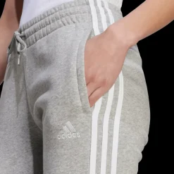 Essentials 3-Stripes Fleece Joggers, joggingbyxa dam - Fritidsbyxor - Essentials 3-Stripes Fleece Joggers, joggingbyxa dam