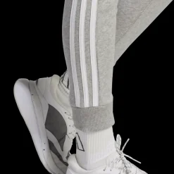 Essentials 3-Stripes Fleece Joggers, joggingbyxa dam - Fritidsbyxor - Essentials 3-Stripes Fleece Joggers, joggingbyxa dam